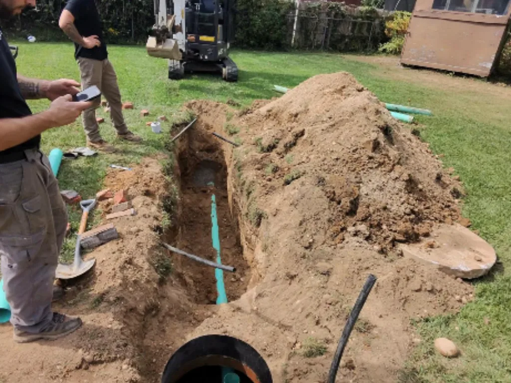 Professional septic-system-repairs an underground septic tank system in Suffolk County NY.